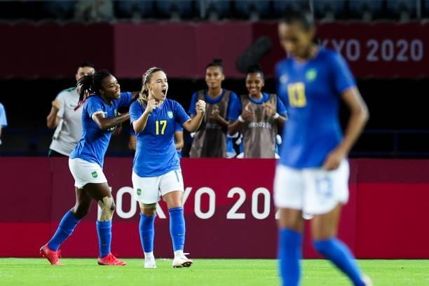 Ludmila of Brazil celebrates her scoring with teammates during the Women's First Round Group F match on day one of the Tokyo 2020 Olympic Games at...