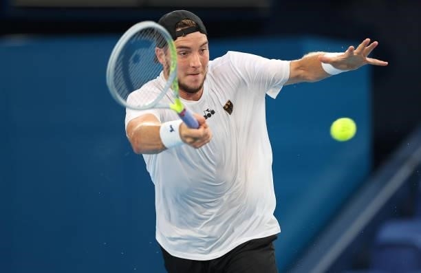 Jan-Lennard Struff of Team Germany plays a forehand during his Men's Singles Second Round match against Novak Djokovic of Team Serbia on day three of...