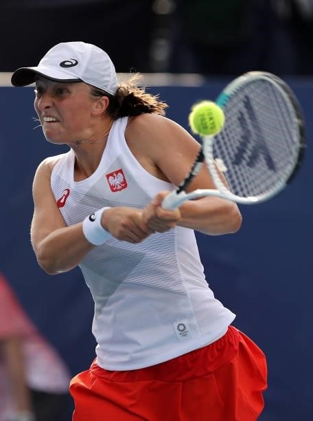 Iga Swiatek of Team Poland plays a backhand during her Women's Singles Second Round match against Paula Badosa of Team Spain on day three of the...