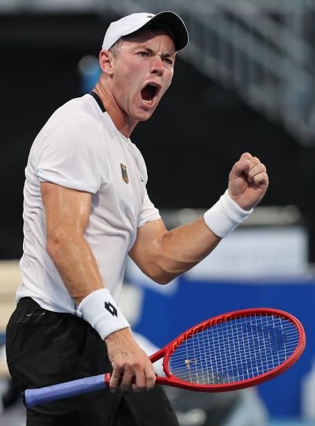 Dominik Koepfer of Team Germany celebrates after match point on day three of the Tokyo 2020 Olympic Games at Ariake Tennis Park on July 26, 2021 in...