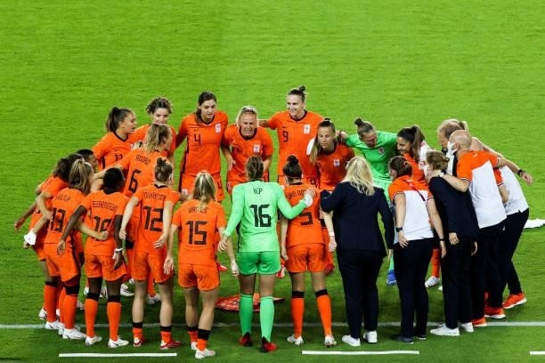 Players of Netherlands encourge each other during the Women's First Round Group F match on day one of the Tokyo 2020 Olympic Games at Miyagi Stadium...