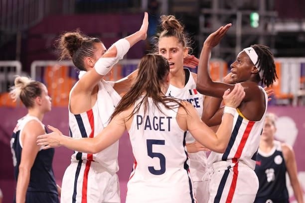 Laetitia Guapo, Ana Maria Filip and Marie-Eve Paget and Mamignan Toure of Team France celebrate victory in the 3x3 Basketball competition on day...