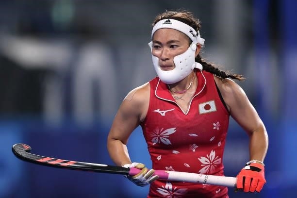 Hazuki Nagai of Team Japan looks on wearing a protective face mask during the Women's Preliminary Pool B match between Japan and New Zealand on day...