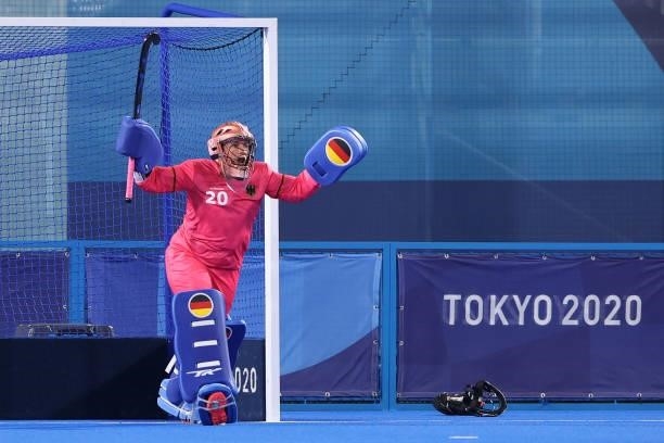 Julia Sonntag of Team Germany celebrates saving a penalty stroke from Gurjit Kaur of Team India during the Women's Preliminary Pool A match between...
