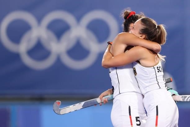 Anne Katarina Schroder of Team Germany celebrates with teammate Selin Oruz after scoring their team's second goal during the Women's Preliminary Pool...