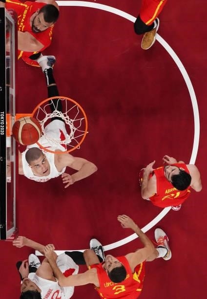 Gavin Earl Edwards of Team Japan watches his layup on the basket during the second half of the Men's Preliminary Round Group C game against Spain on...