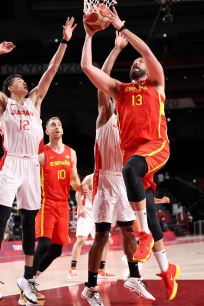 Marc Gasol of Team Spain drives to the basket against Yuta Watanabe of Team Japan during the second half of the Men's Preliminary Round Group C game...
