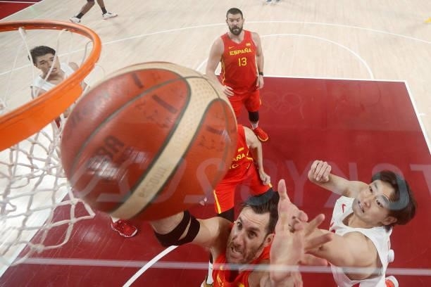 Rudy Fernandez of Team Spain pulls down a rebound over Yuta Watanabe of Team Japan during the second half of the Men's Preliminary Round Group C game...