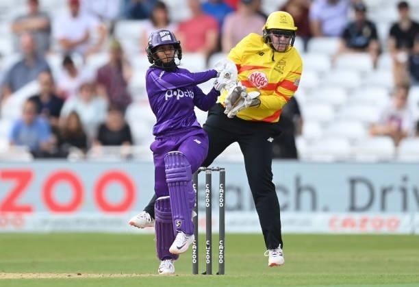 Jemimah Rodrigues of Northern Superchargers hits out watched by Rachel Priest of Trent Rockets during The Hundred match between Trent Rockets and...