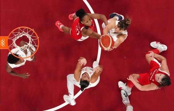 Tina Krajisnik of Team Serbia pulls down a rebound over Nirra Fields of Team Canada during the first half of the Men's Preliminary Round Group C game...