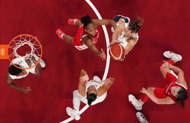 Tina Krajisnik of Team Serbia pulls down a rebound over Nirra Fields of Team Canada during the first half of the Men's Preliminary Round Group C game...