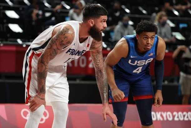 Vincent Poirier of France, Keldon Johnson of USA during the Men's Preliminary Round Group B basketball game between United States and France on day...