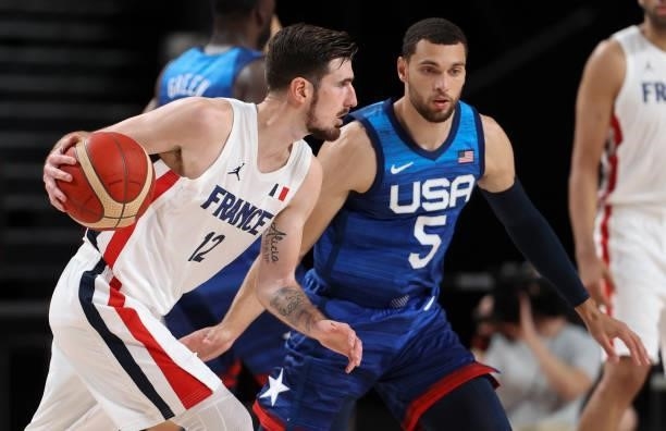 Nando de Colo of France, Zach Lavine of USA during the Men's Preliminary Round Group B basketball game between United States and France on day two of...
