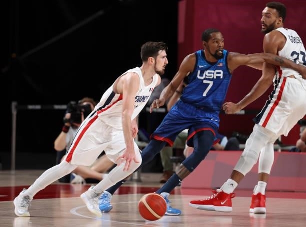 Nando de Colo of France, Kevin Durant of USA, Rudy Gobert of France during the Men's Preliminary Round Group B basketball game between United States...