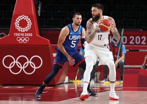 Vincent Poirier of France, Zach Lavine of USA during the Men's Preliminary Round Group B basketball game between United States and France on day two...