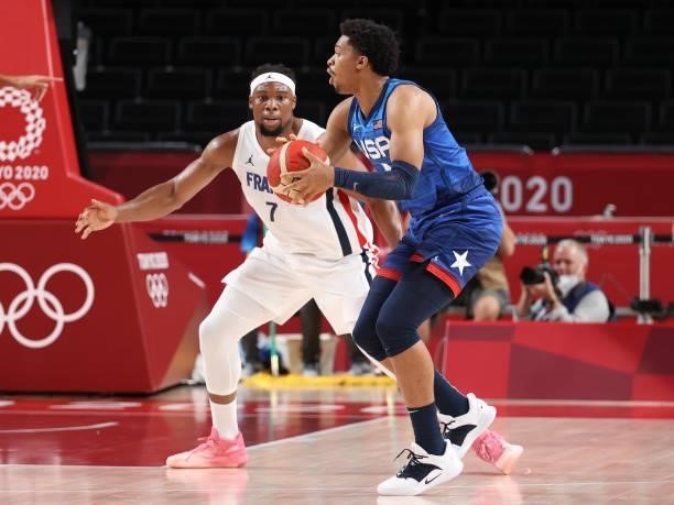Keldon Johnson of USA, Guerschon Yabusele of France during the Men's Preliminary Round Group B basketball game between United States and France on...
