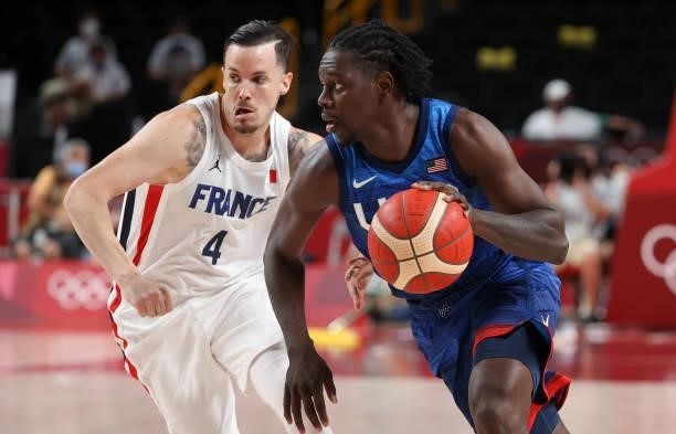 Jrue Holiday of USA, Thomas Heurtel of France during the Men's Preliminary Round Group B basketball game between United States and France on day two...