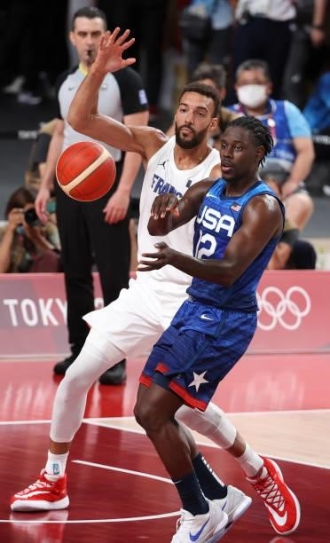 Jrue Holiday of USA, Rudy Gobert of France during the Men's Preliminary Round Group B basketball game between United States and France on day two of...