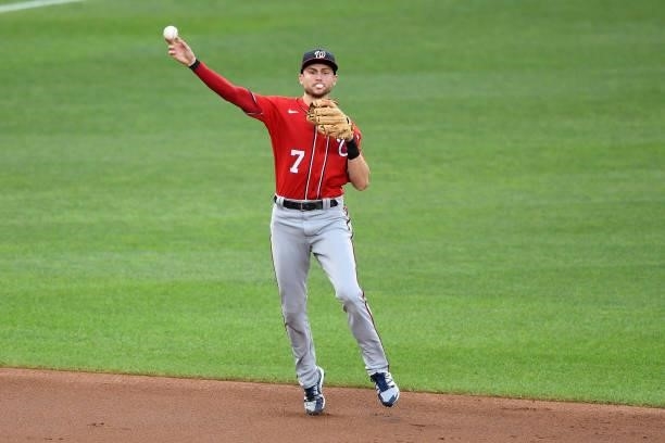 Trea Turner of the Washington Nationals fields a ground ball during a baseball game against the Baltimore Orioles at Oriole Park at Camden Yards on...