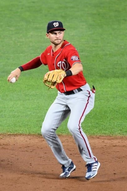 Trea Turner of the Washington Nationals fields a ground ball during a baseball game against the Baltimore Orioles at Oriole Park at Camden Yards on...