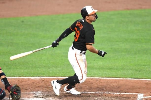 Ramon Urias of the Baltimore Orioles takes a swing during a baseball game against the Washington Nationals at Oriole Park at Camden Yards on July 23,...