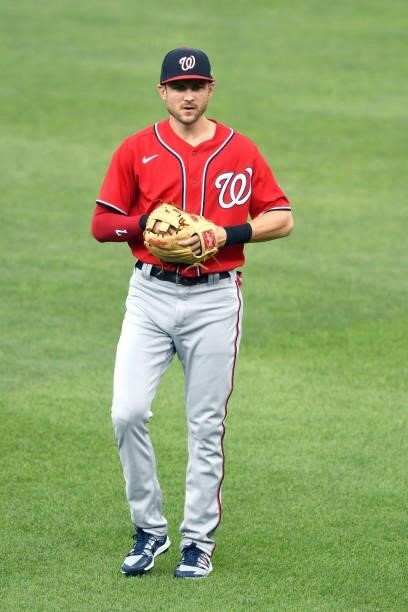 Trea Turner of the Washington Nationals warms up before a baseball game against the Baltimore Orioles at Oriole Park at Camden Yards on July 23, 2021...