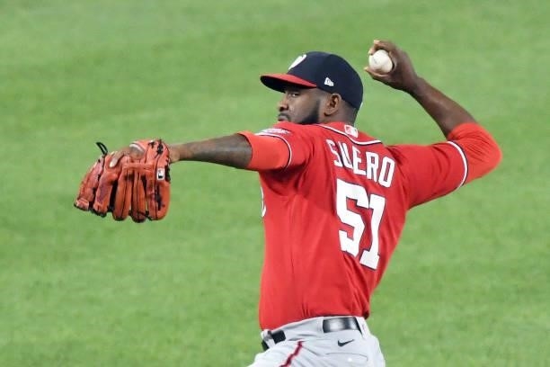 Wander Suero of the Washington Nationals pitches during a baseball game against the Baltimore Orioles at Oriole Park at Camden Yards on July 23, 2021...