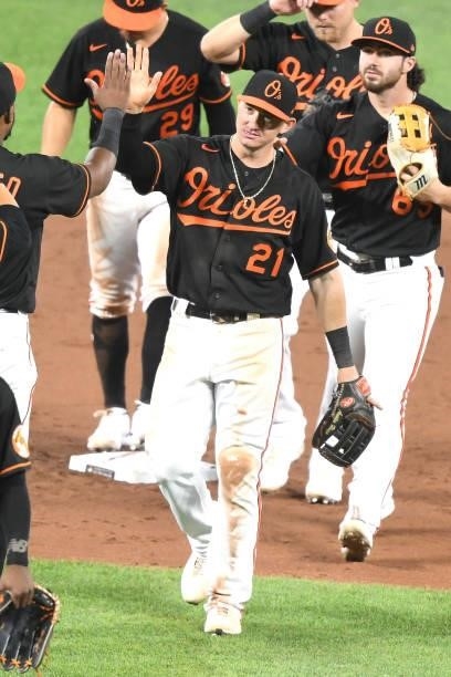 Austin Hays of the Baltimore Orioles celebrates a win after a baseball game against the Washington Nationals at Oriole Park at Camden Yards on July...