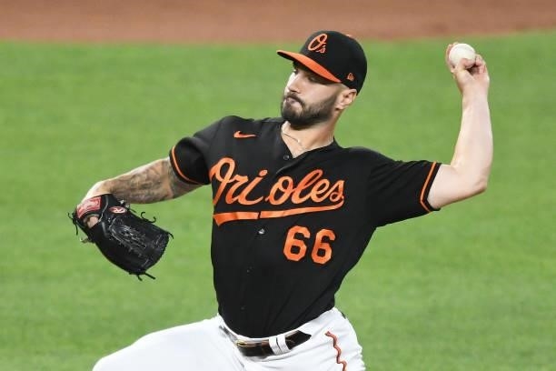 Tanner Scott of the Baltimore Orioles pitches during a baseball game against the Washington Nationals at Oriole Park at Camden Yards on July 23, 2021...