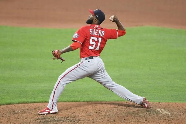 Wander Suero of the Washington Nationals pitches during a baseball game against the Baltimore Orioles at Oriole Park at Camden Yards on July 23, 2021...