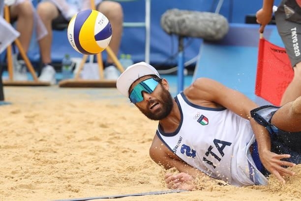 Daniele Lupo of Team Italy looks on after missing a hit against Team Japan during the Men's Preliminary - Pool F beach volleyball on day four of the...