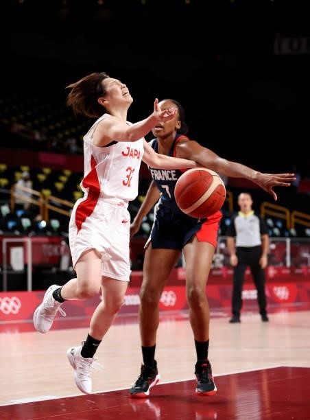 Sandrine Gruda of Team France knocks the ball from the hands of Saori Miyazaki of Team Japan drives to the basket during the first half of a Women's...