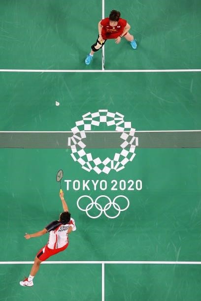 Yuki Fukushima and Sayaka Hirota of Team Japan compete against Greysia Polii and Apriyani Rahayu of Team Indonesia during a Women's Doubles Group A...