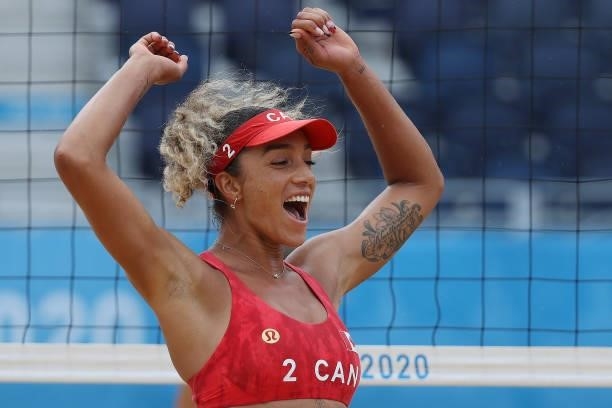 Brandie Wilkerson of Team Canada celebrates against Team Argentina during the Women's Preliminary - Pool C beach volleyball on day four of the Tokyo...