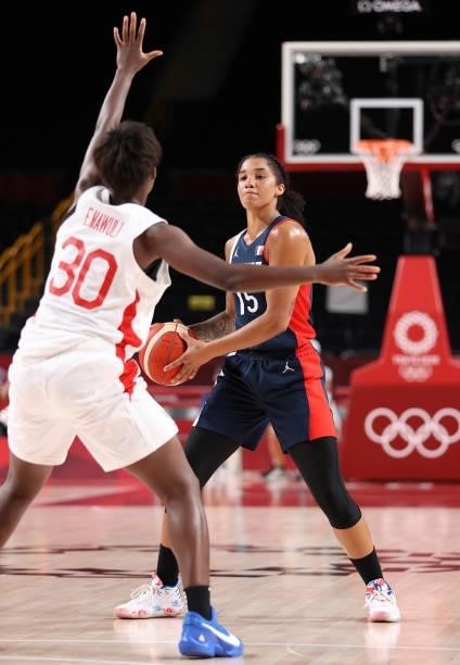 Gabrielle Williams of Team France sets up a play against Evelyn Mawuli of Team Japan during a Women's Preliminary Round Group B game on day four of...