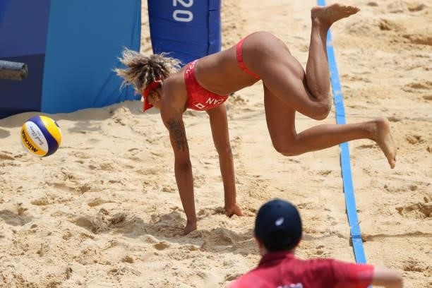 Brandie Wilkerson of Team Canada attempts to return the ball against Team Argentina during the Women's Preliminary - Pool C beach volleyball on day...