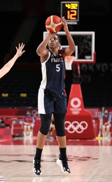 Endene Miyem of Team France shoots against Japan during a Women's Preliminary Round Group B game on day four of the Tokyo 2020 Olympic Games at...