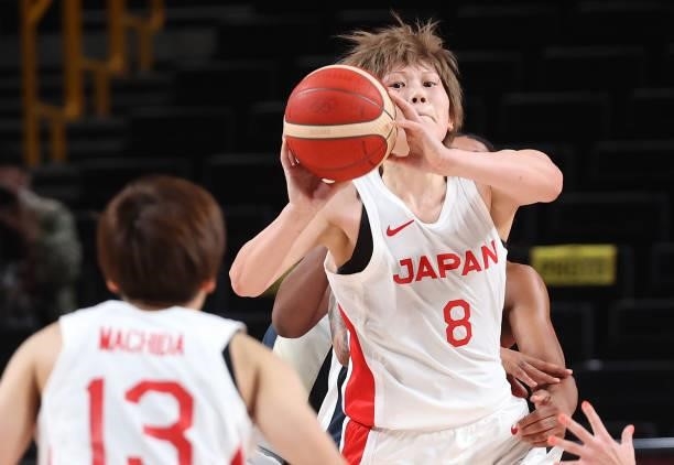 Maki Takada of Team Japan passes against France during a Women's Preliminary Round Group B game on day four of the Tokyo 2020 Olympic Games at...