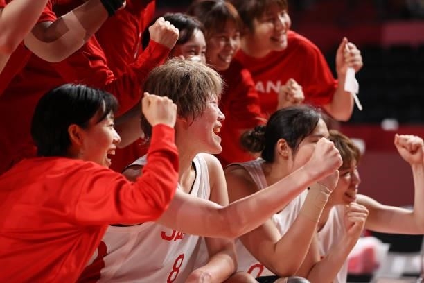 Maki Takada of Team Japan celebrates a win against France with teammates following a Women's Preliminary Round Group B game on day four of the Tokyo...