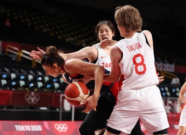 Maki Takada of Team Japan pressures Helena Ciak of Team France during a Women's Preliminary Round Group B game on day four of the Tokyo 2020 Olympic...