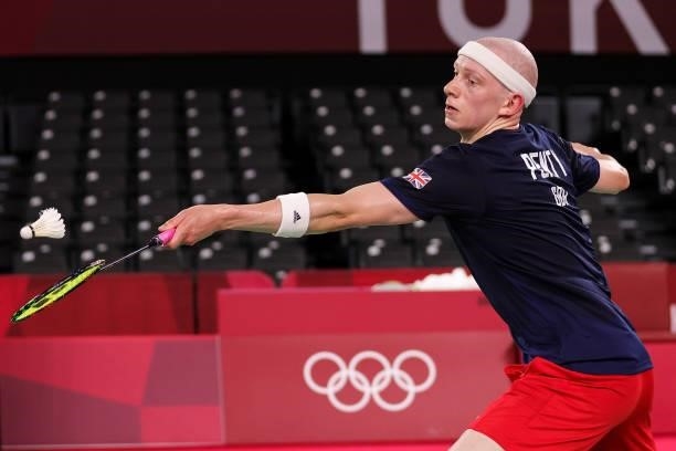 Toby Penty of Team Great Britain competes against Kai Schaefer of Team Germany during a Men's Singles Group K match on day four of the Tokyo 2020...