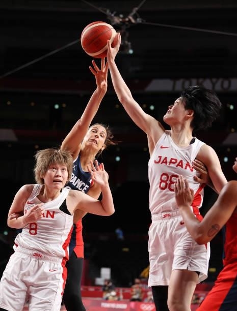Himawari Akaho of Team Japan is defended by Helena Ciak of Team France during a Women's Preliminary Round Group B game on day four of the Tokyo 2020...