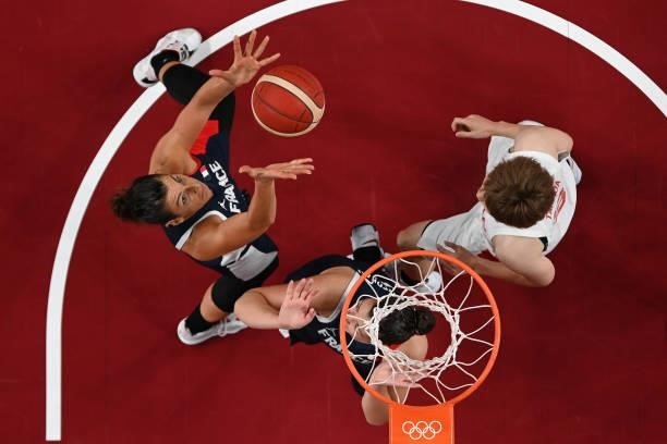 Helena Ciak of Team France grabs a rebound against Maki Takada of Team Japan during a Women's Preliminary Round Group B game on day four of the Tokyo...