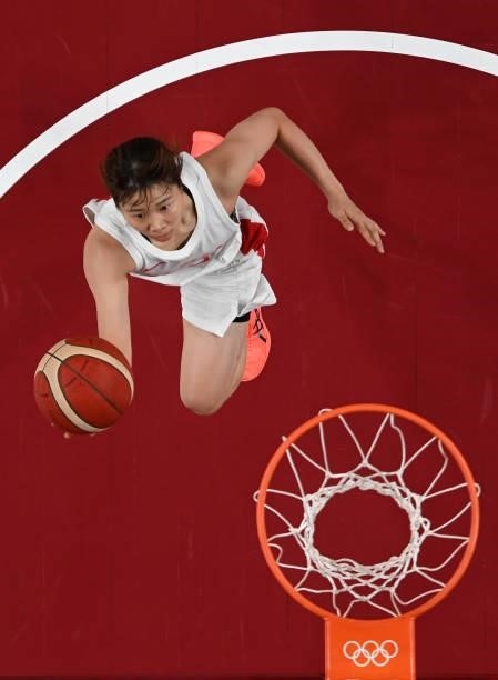 Nanako Todo of Team Japan goes up for a shot against France during a Women's Preliminary Round Group B game on day four of the Tokyo 2020 Olympic...