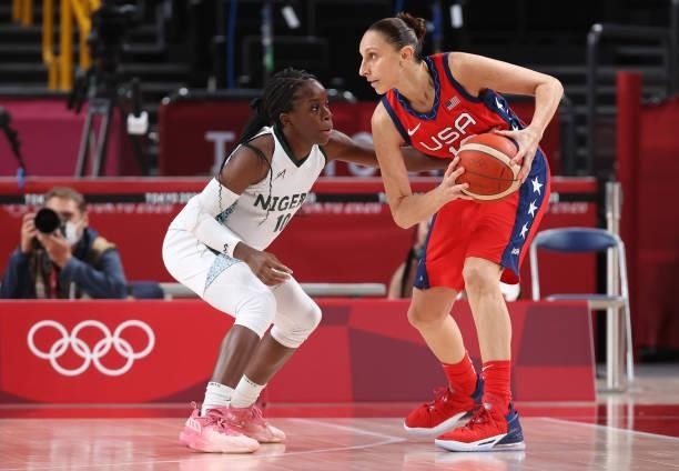 Promise Amukamara of Team Nigeria pressures Diana Taurasi of Team United States during a Women's Preliminary Round Group B game on day four of the...