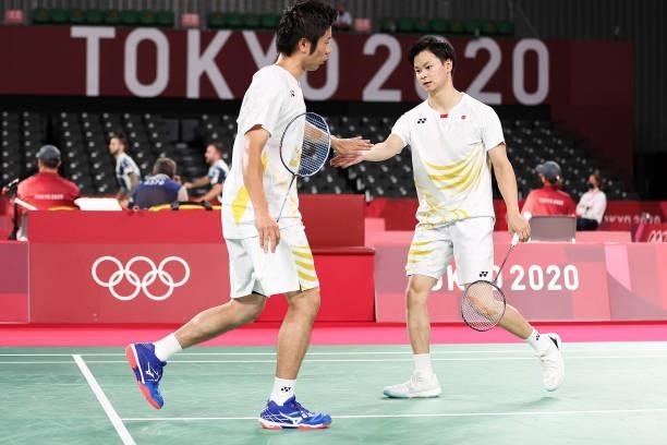 Hiroyuki Endo and Yuta Watanabe of Team Japan react as they compete against Kim Astrup and Anders Skaarup Rasmussen of Team Denmark during a Men's...