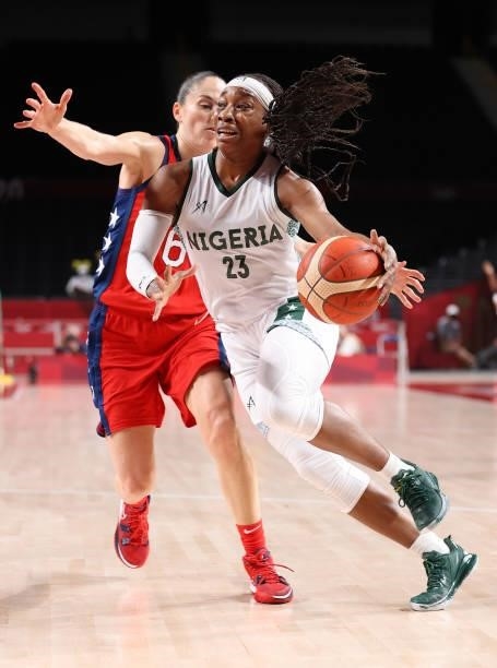 Ezinne Kalu of Team Nigeria drives to the basket against Sue Bird of Team United States during a Women's Preliminary Round Group B game on day four...