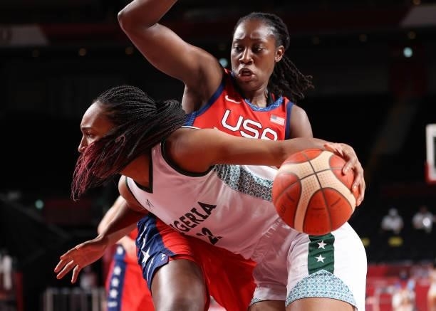Oderah Chidom of Team Nigeria drives to the basket against Tina Charles of Team United States during a Women's Preliminary Round Group B game on day...