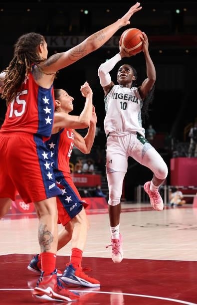 Promise Amukamara of Team Nigeria shoots against United States of America during a Women's Preliminary Round Group B game on day four of the Tokyo...
