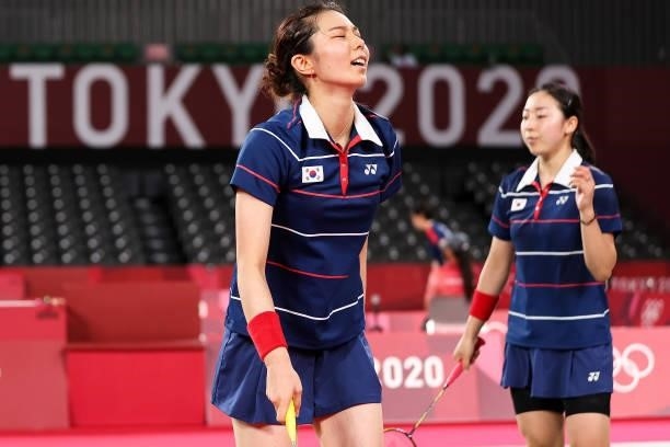 Chen Qing Chen and Jia Yi Fan of Team China react as they compete against Kim Soyeong and Kong Heeyong of Team South Korea during a Women's Doubles...
